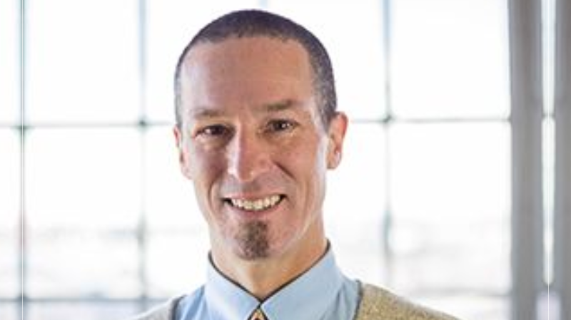 Portrait of Dr. Ray McClanahan, who invented Correct Toes toe spacers