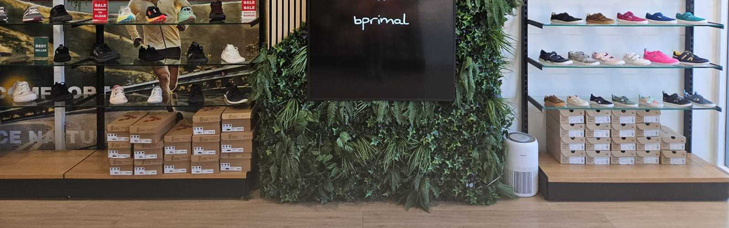 The interior of the Bprimal Neutral Bay, Sydney store showing shoe displays and shoe boxes.