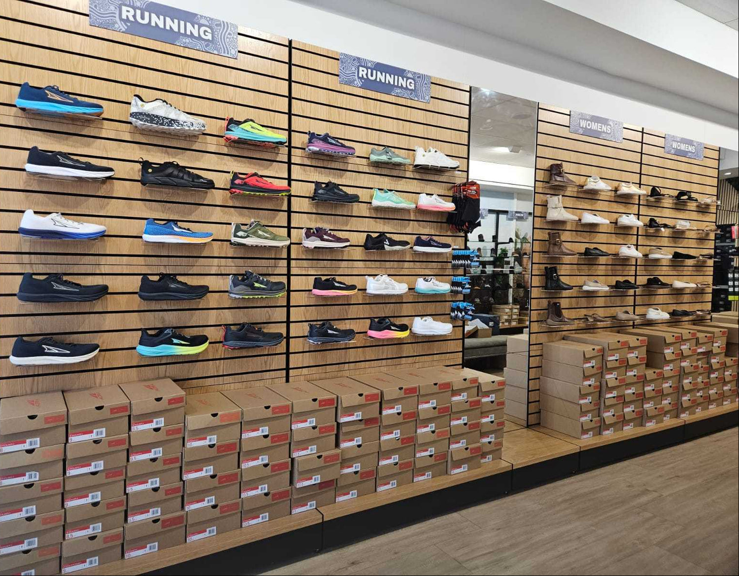 Shoe display showing the interior wall of the Bprimal Neutral Bay, Sydney store